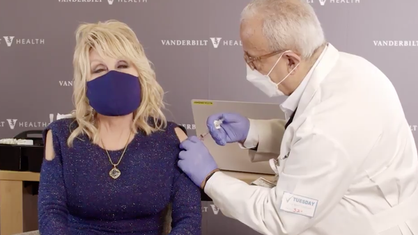 Watch: 'Vaccine, Vaccine': Dolly Sings 'Jolene' Rewrite for Shot